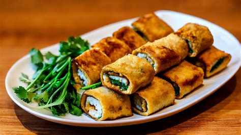   Pu'er City's Crispy Tofu Skin Rolls: Savoring Aromatic Herbs and Dipping into Tangy Delights?